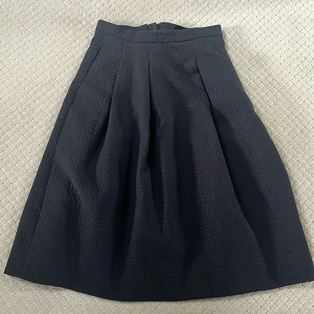 H & M size 4 skirt black with pleats.